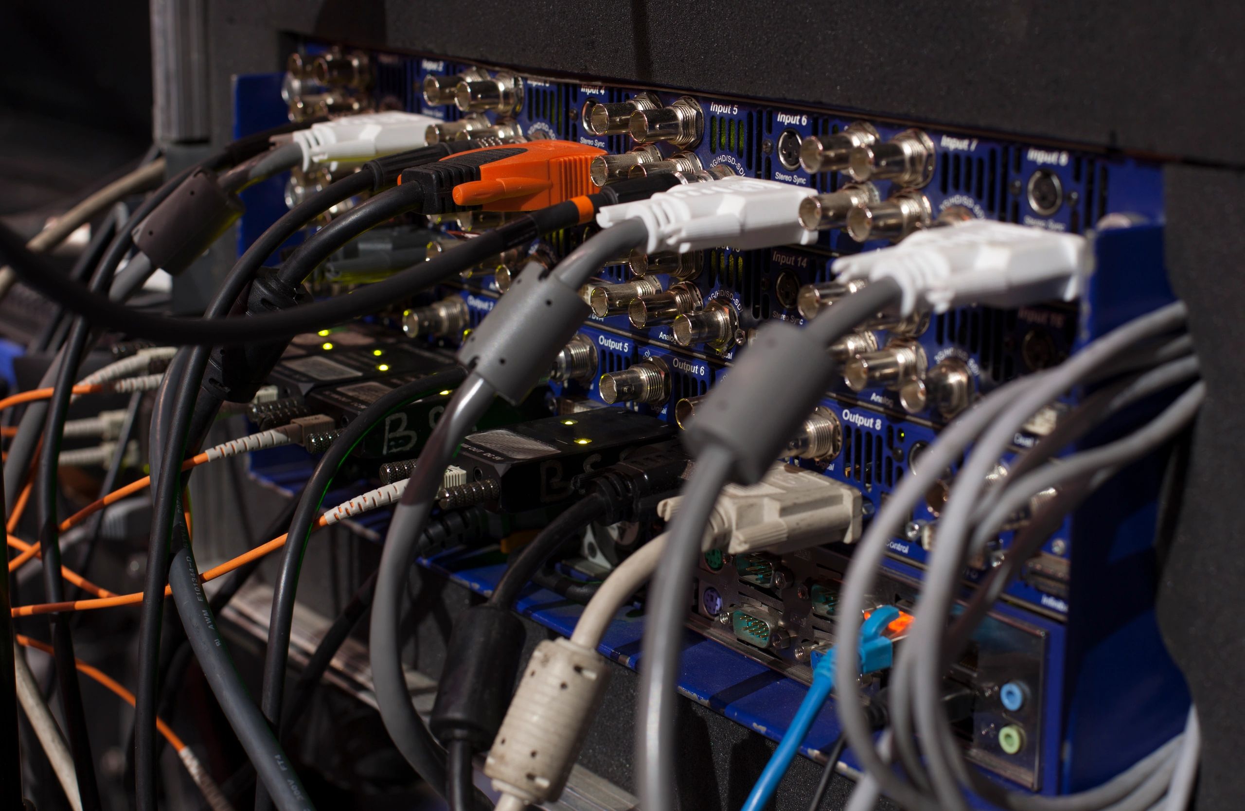 Broadcast control panel with buttons and screens.