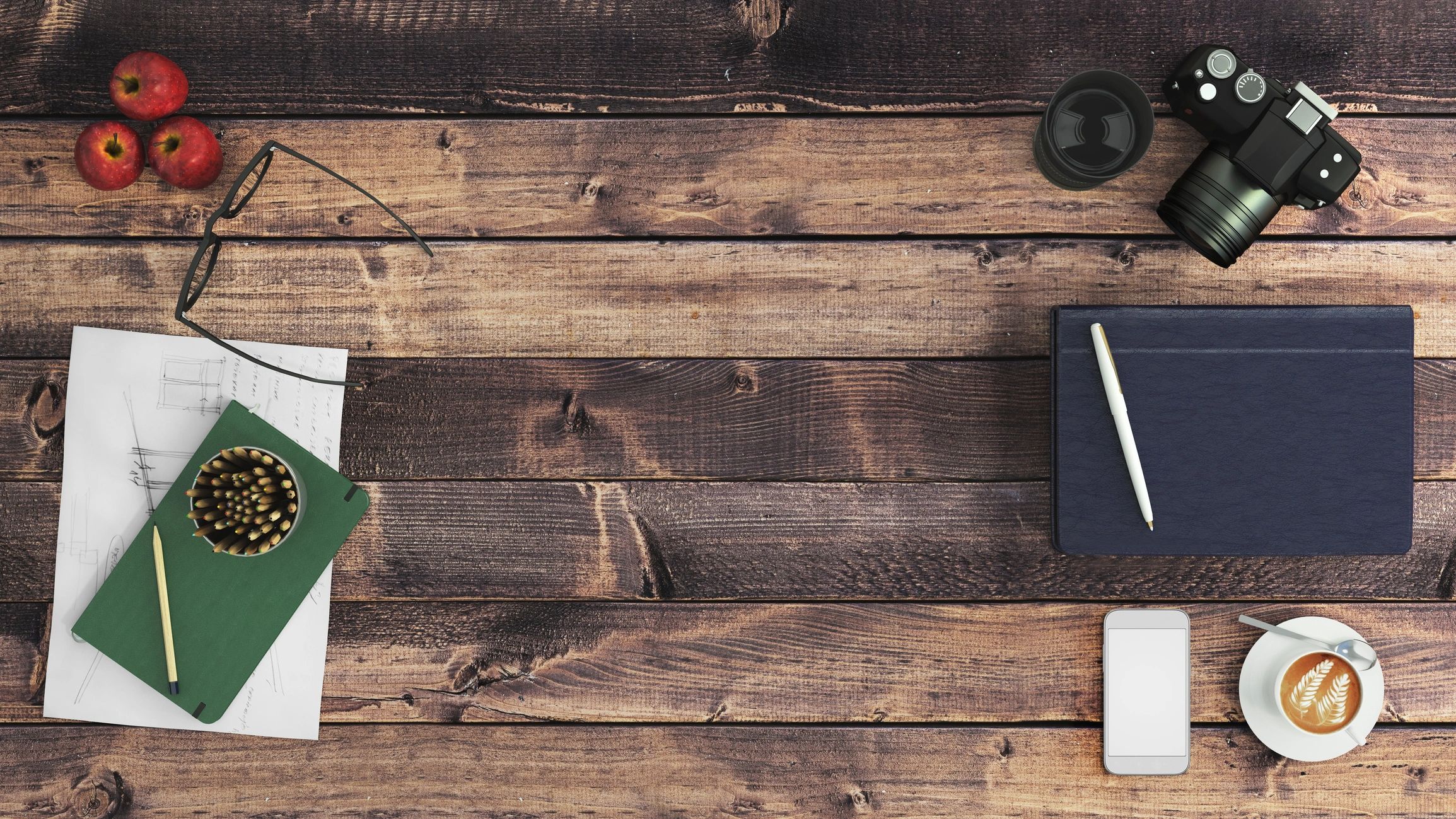 Minimal desk flatlay with notebook and coffee